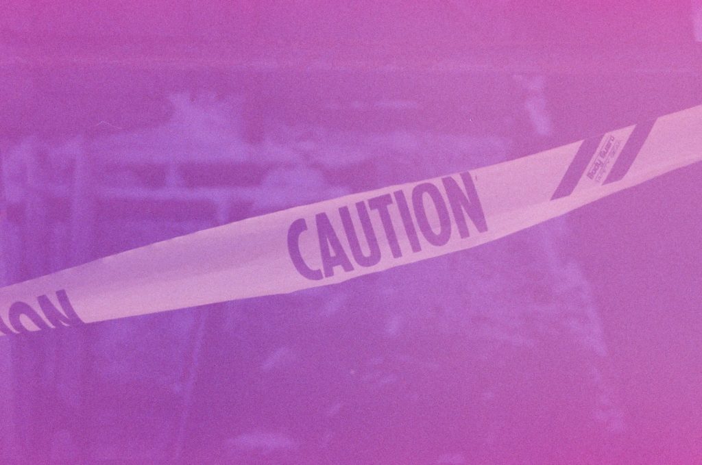 Caution Tape Purple Background