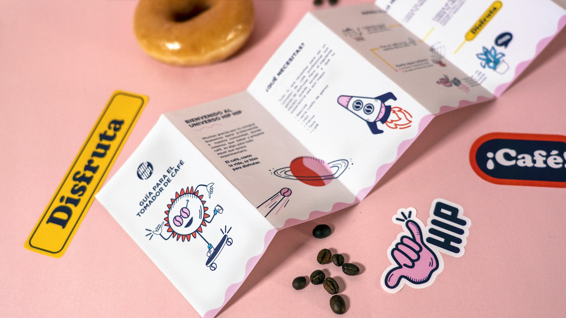 Fun branding leaflet of Spanish company with stickers on pink background