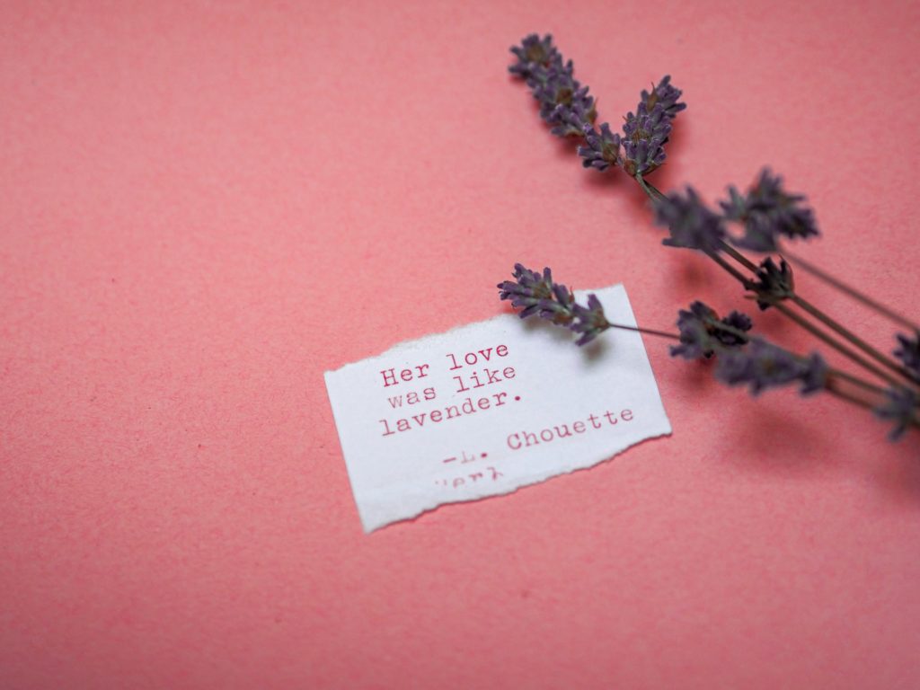 Pink background with lavender and a note saying "Her love was like lavender"