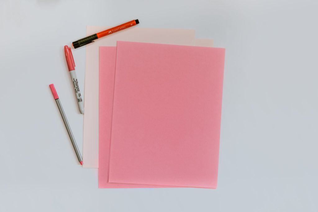 Pink paper and sharpie for writing