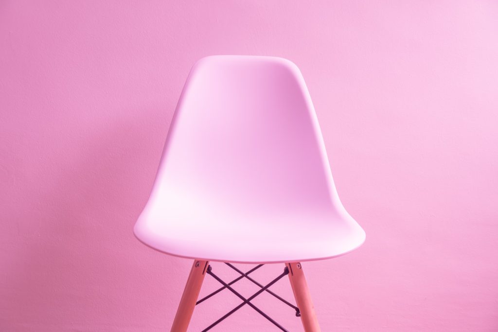 Pink background with pink chair.